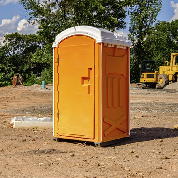 how often are the portable restrooms cleaned and serviced during a rental period in Mauk